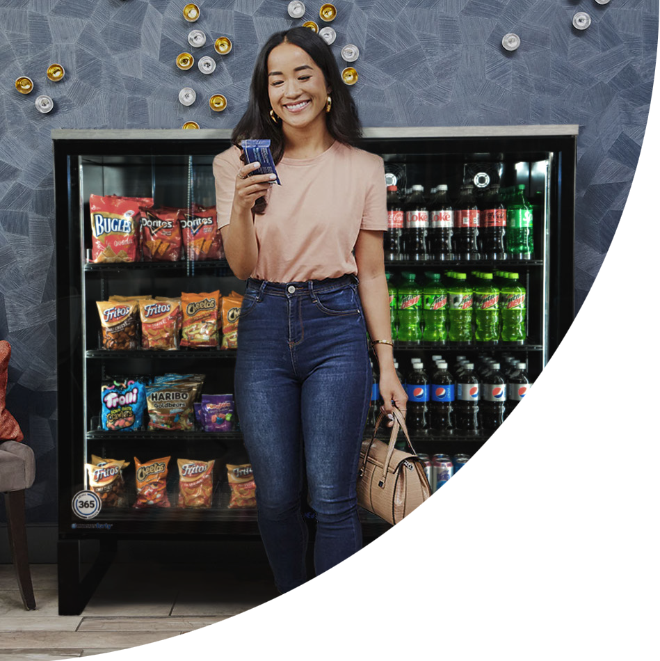 Happy customer making a purchase at the Smart Cabinet