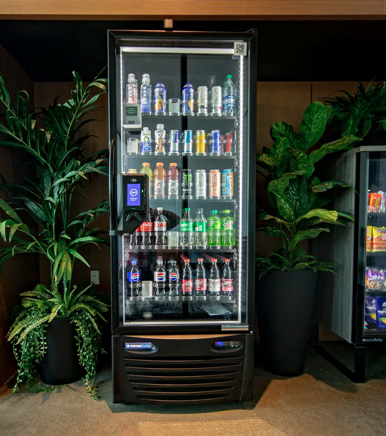 Refrigerated Cooler in a lobby surrounded by plants